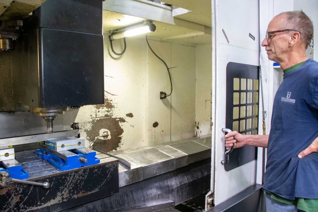 Titletown Manufacturing employee working